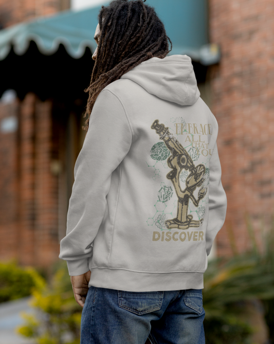 man wearing Embrace All That You Discover microscope grey hoodie back view