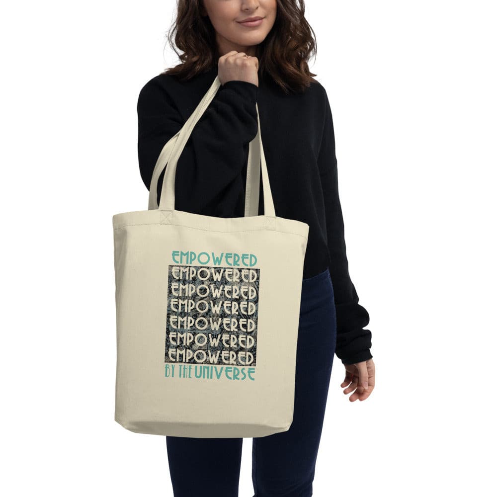 women holding eco tote bag oyster Empowered by the Univerese